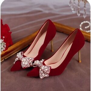 Elegant Red Heels with Pearl Bow